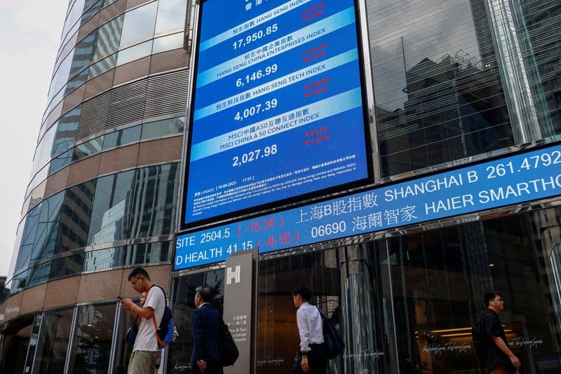 Wall Street wobbles, oil surges as US blockade of Iran looms