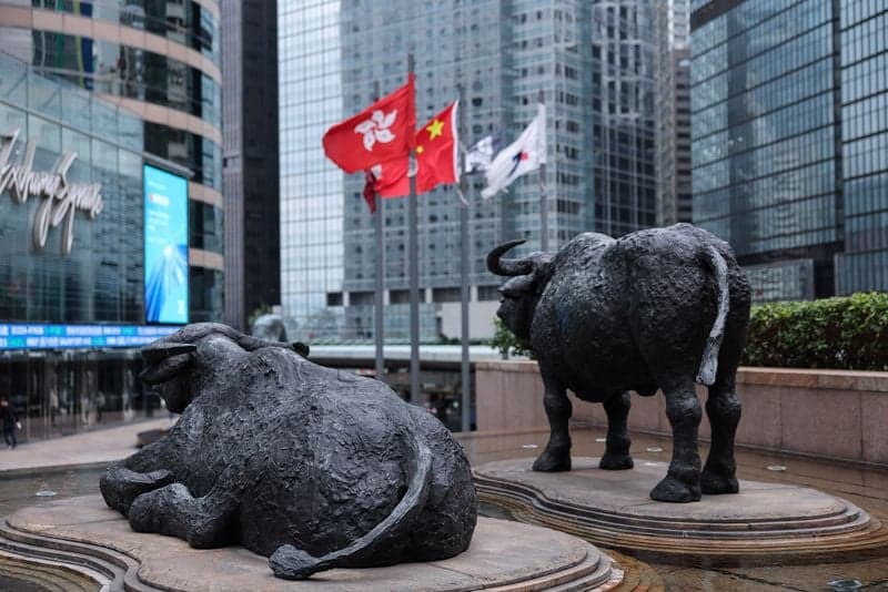 Asian shares slip as earnings loom, oil weighed by supply